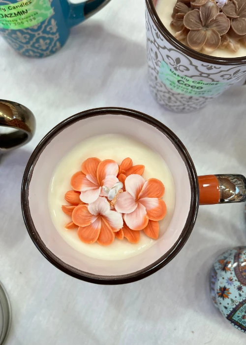 comprar tazas con velas dentro canela y naranja arriba